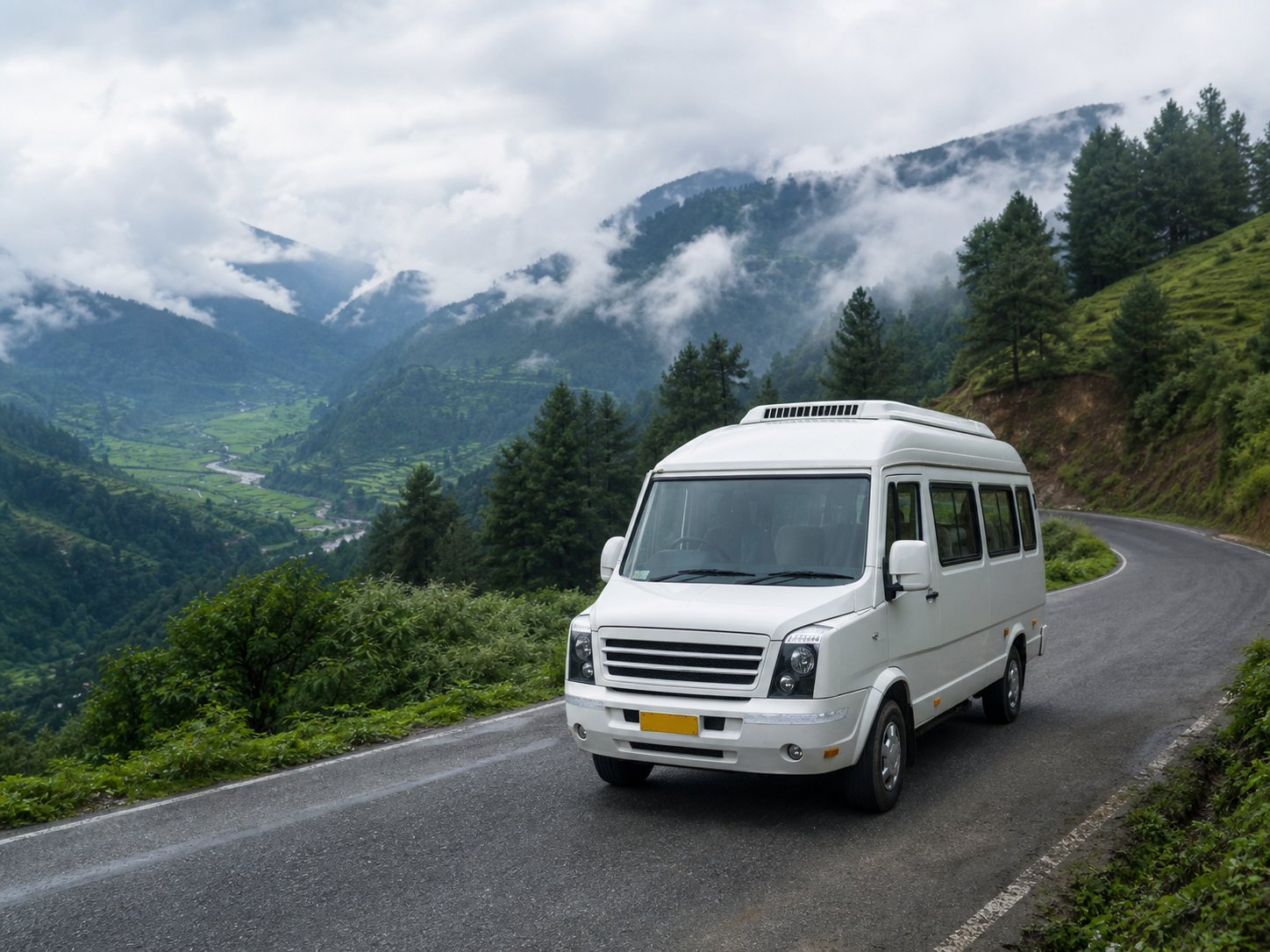 Traveller minibus on a misty mountain road near Ziro