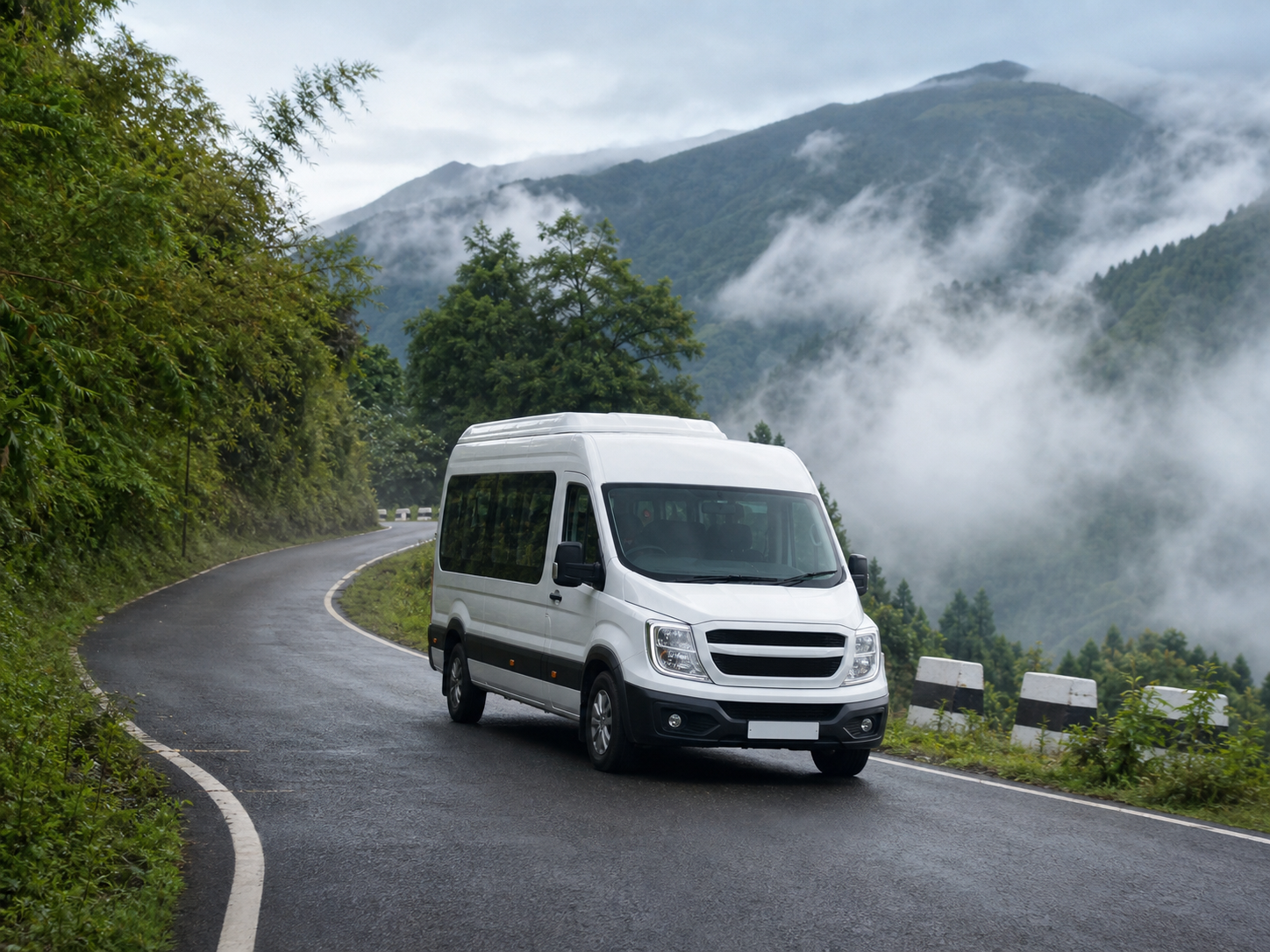 Urbania van on a winding mountain road near Ziro